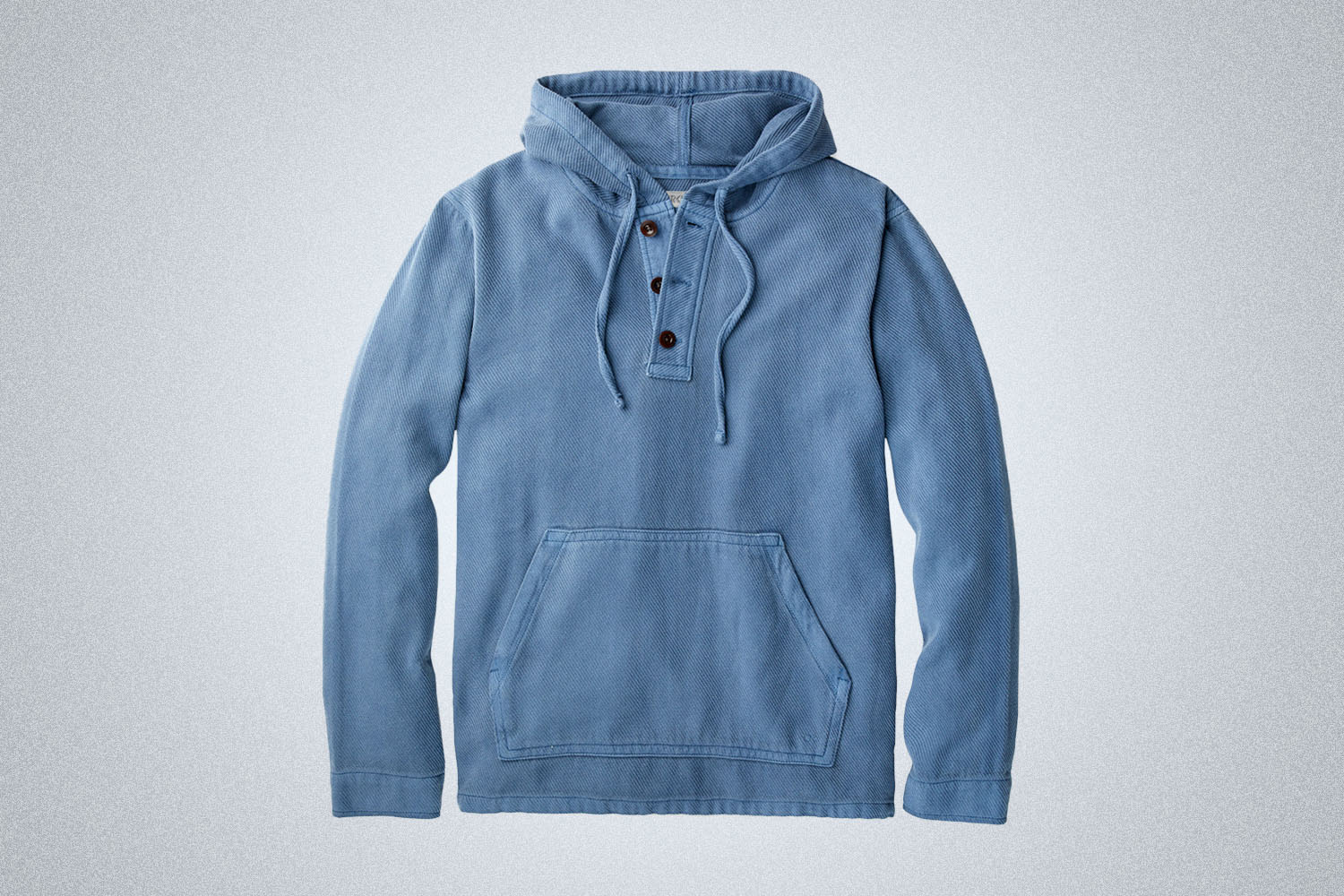 a light blue hoodie on a grey background